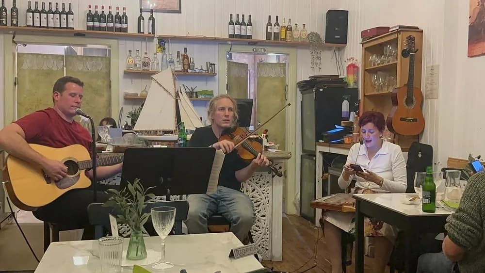 Musicians playing guitar and violin