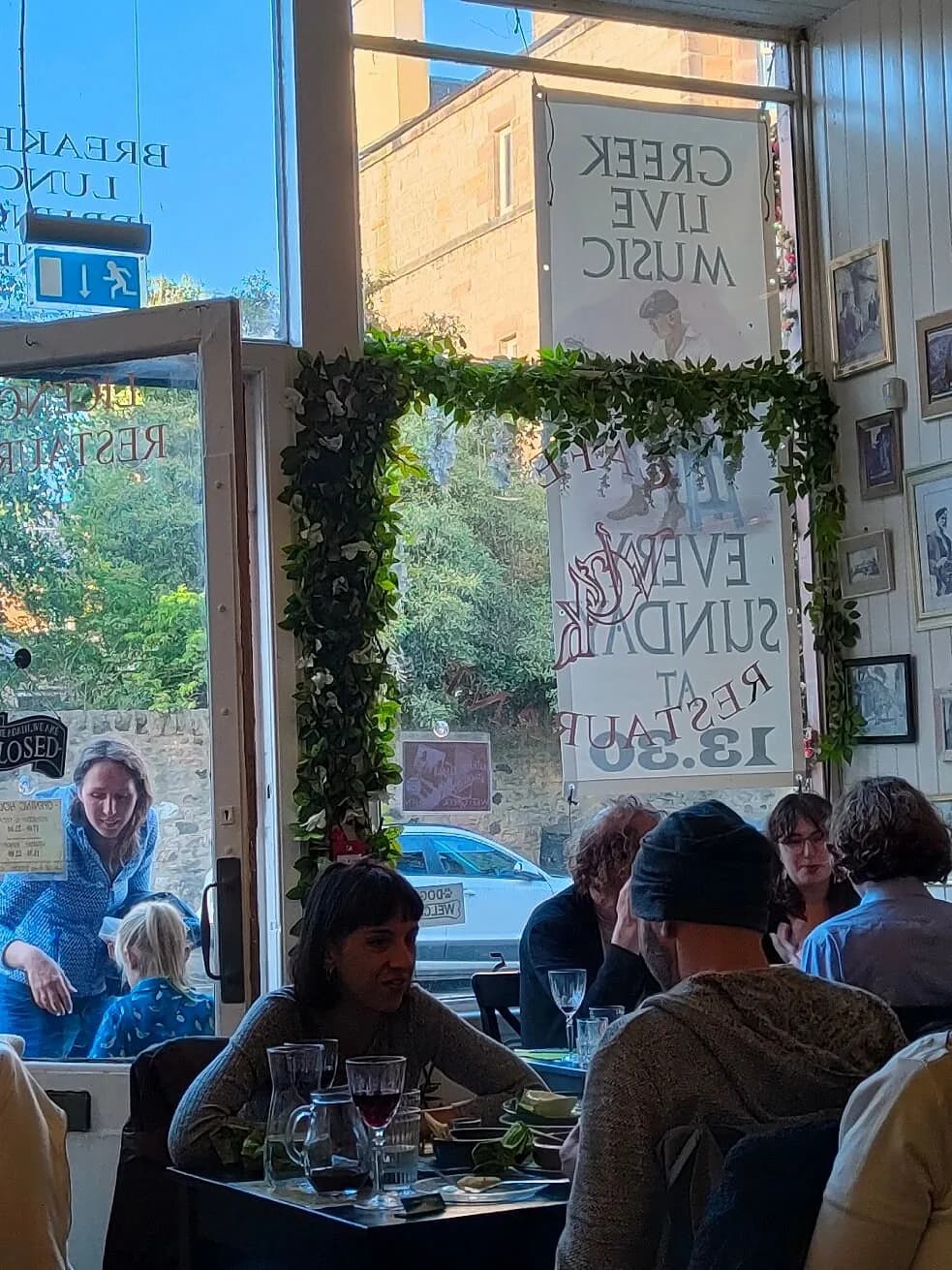Guests dining by the window