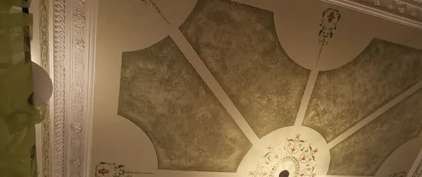 The painted ceiling above the dining room