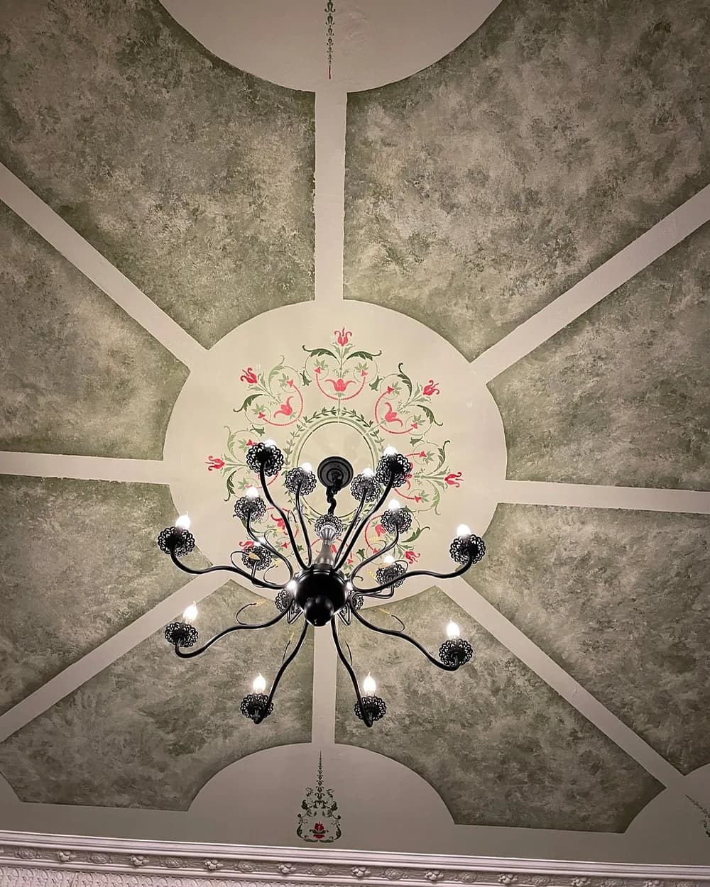 Hand-painted floral ceiling with chandelier